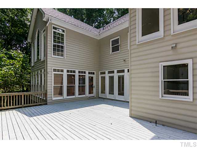 1300 Milvaney Court Raleigh, NC 27615 - Photo 22 of 25 Huge rear deck with gas stub for entertaining.