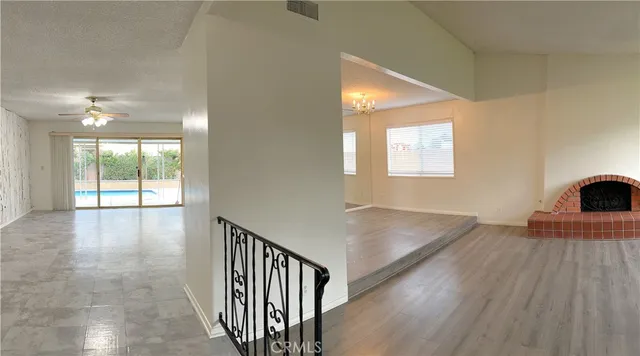 a view of a livingroom with furniture and wooden floor