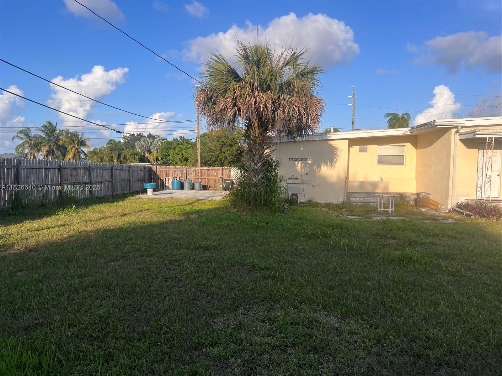4475 Kirk Road Lake Worth, FL 33461 - Photo 2 of 26 a view of a backyard of the house
