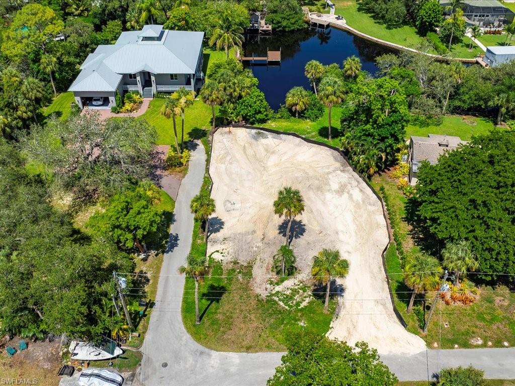 27207 Rio Vista Circle Bonita Springs, FL 34135 - Photo 11 of 13 an aerial view of a house