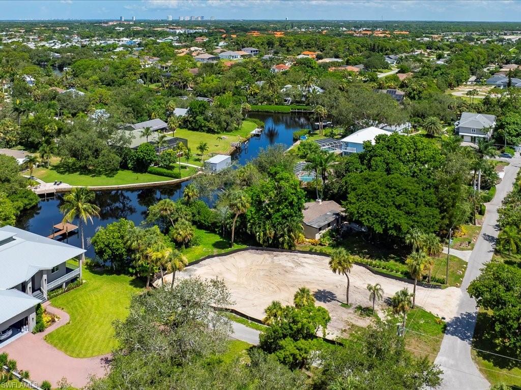 27207 Rio Vista Circle Bonita Springs, FL 34135 - Photo 10 of 13 an aerial view of a house with a yard