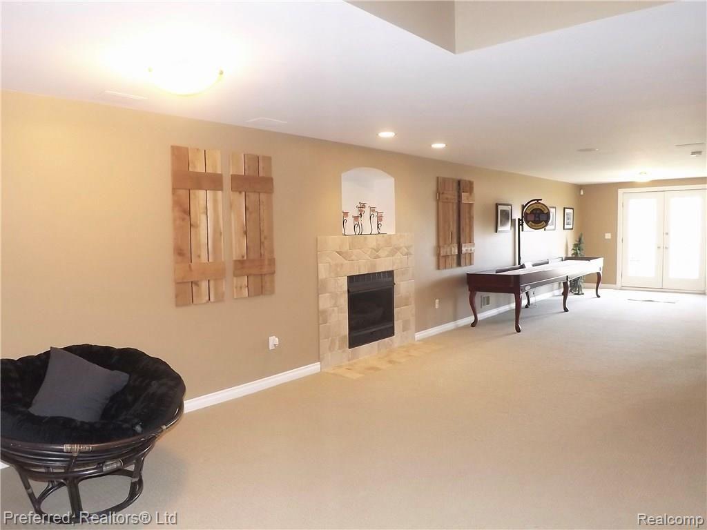 147 West Reed Lk Court Commerce Township, MI 48382 - Photo 34 of 46 Gas Fireplace in Lower Level