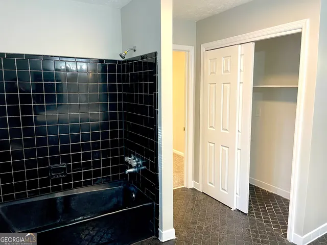 a bathroom with a glass shower