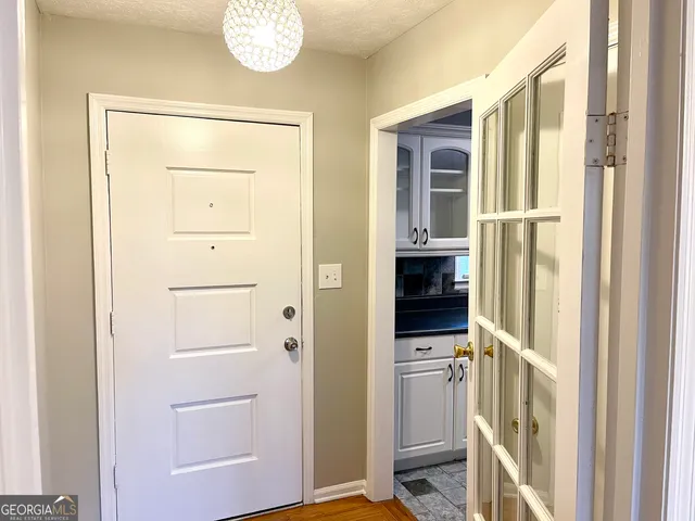 a view of a bathroom from the hallway