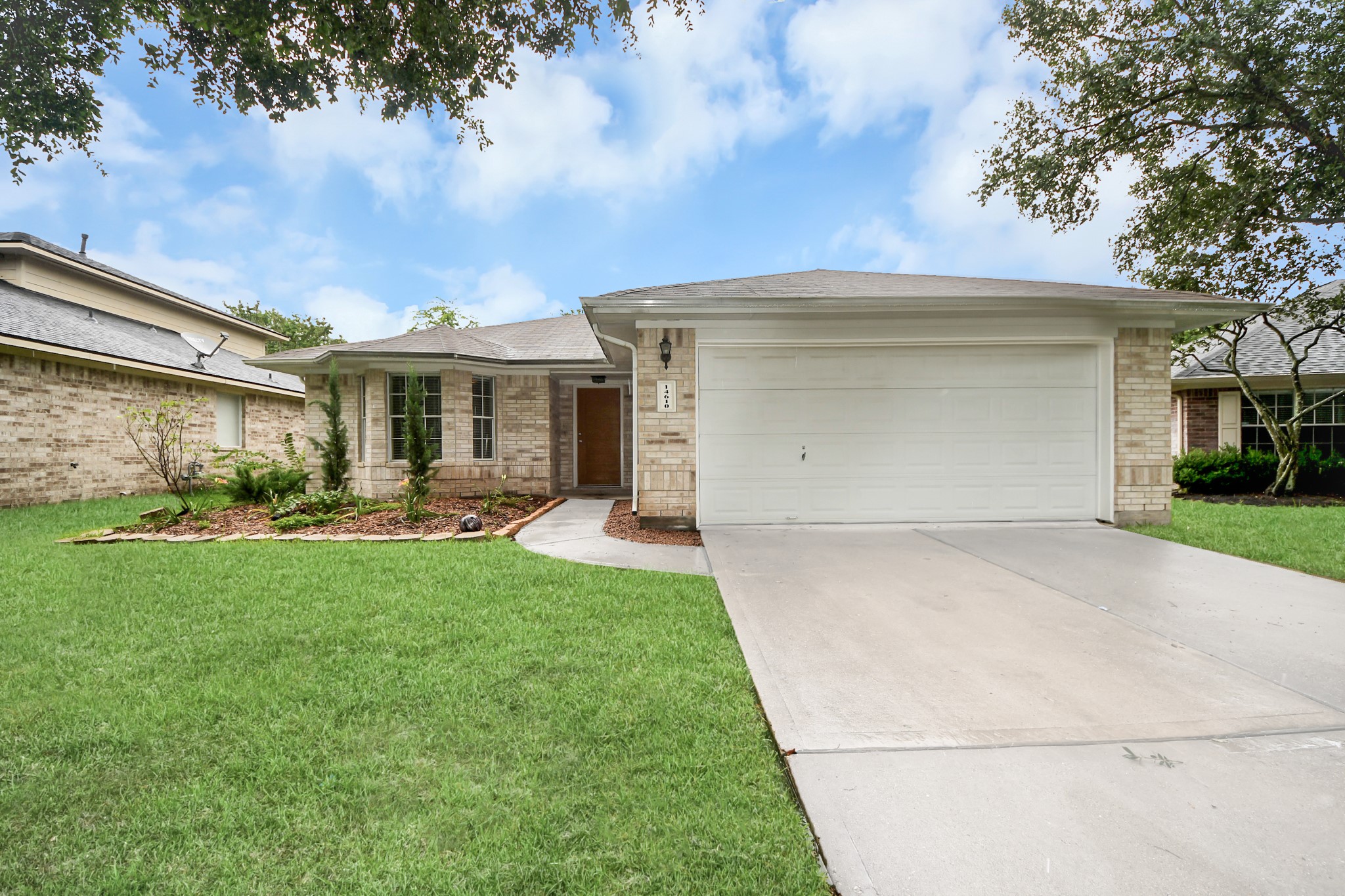 14610 Hazy Ridge Lane Cypress, TX 77429 - Photo 1 of 44 Welcome Home! Impressive front exterior showcasing timeless design, manicured grounds, and a warm, welcoming presence that makes a lasting first impression.