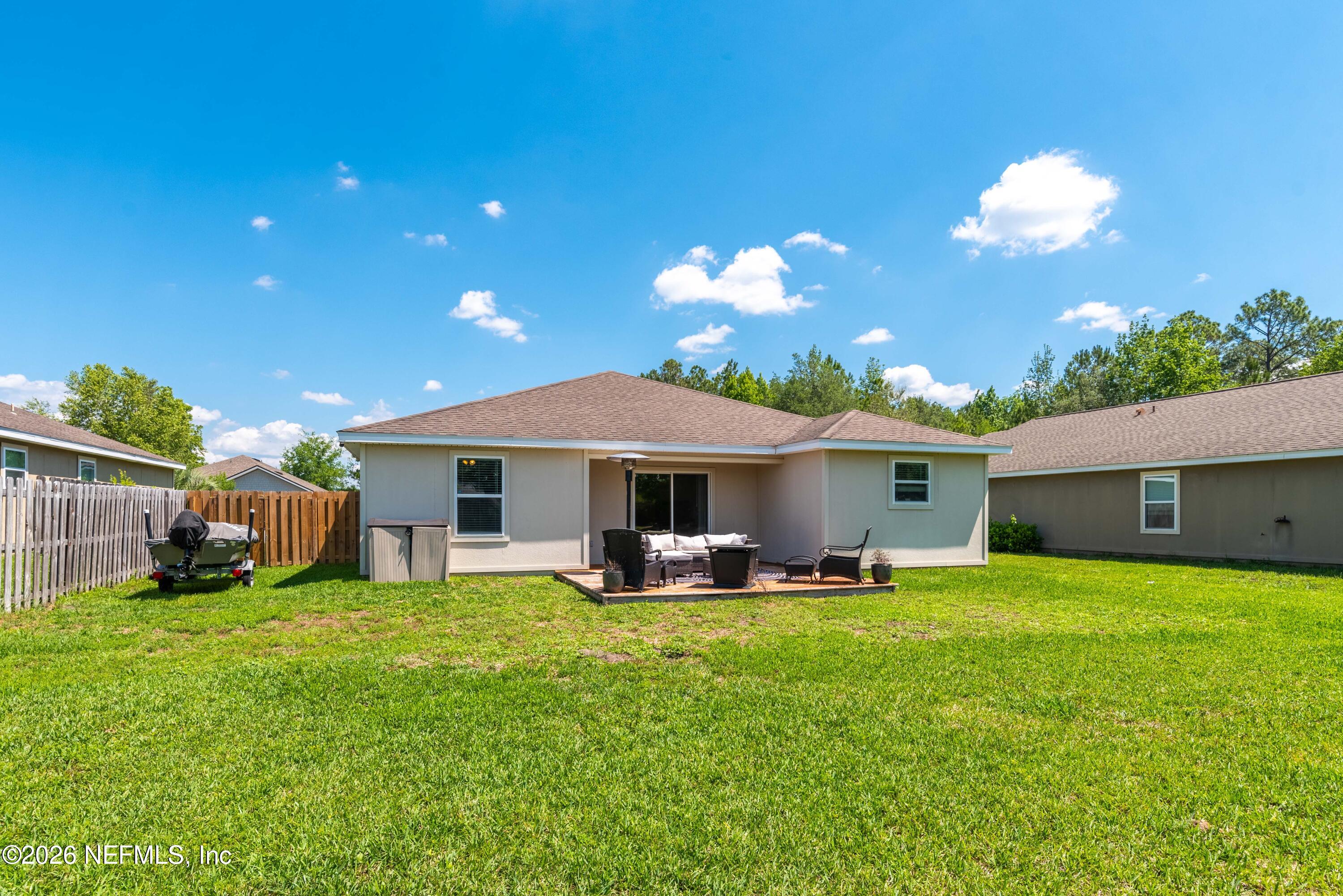 6178 Daylilly Road Macclenny, FL 32063 - Photo 28 of 29 a view of a house with a yard and sitting area