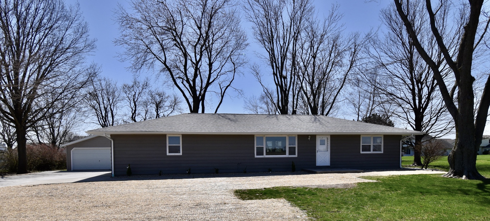413 East Northtown Road North Normal, IL 61761 - Photo 1 of 20 a front view of a house with a yard