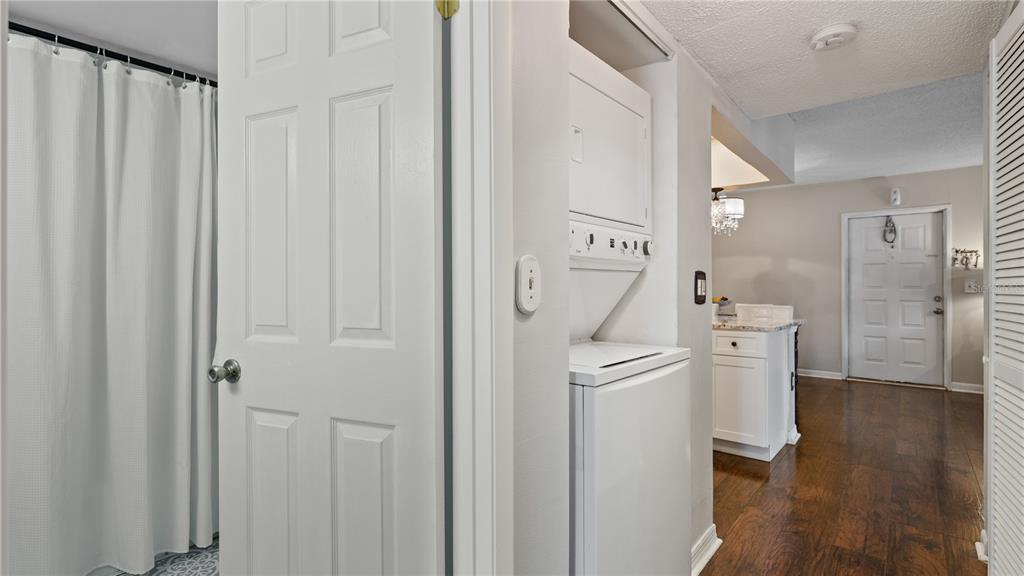 8203 Sun Spring Circle, Unit 12 Orlando, FL 32825 - Photo 15 of 38 a bathroom with a sink a toilet and shower