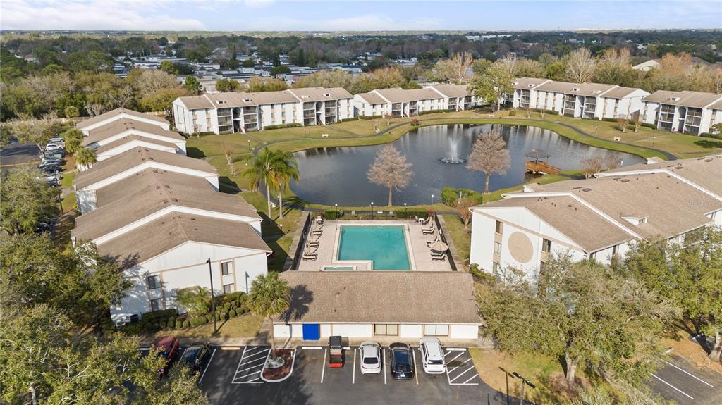 8203 Sun Spring Circle, Unit 12 Orlando, FL 32825 - Photo 34 of 38 an aerial view of a house with a lake view