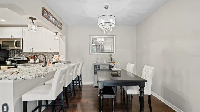 a view of a dining room with furniture