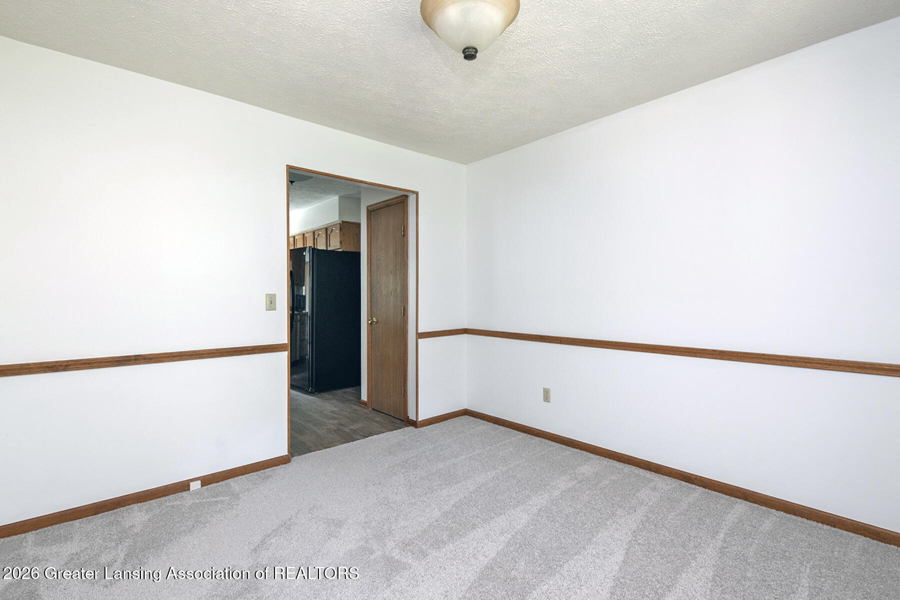 2620 Grovenburg Road Lansing, MI 48911 - Photo 6 of 39 06
