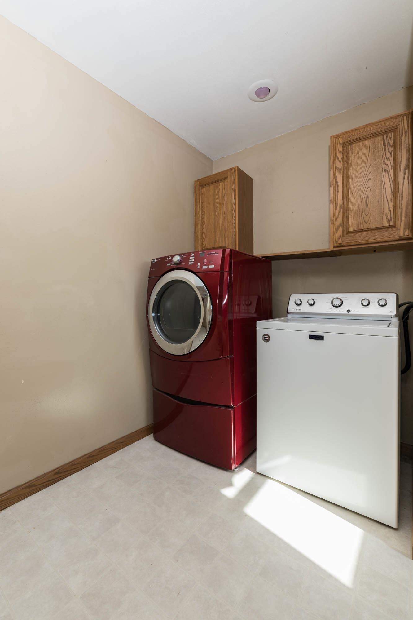 4868 Garden Prairie Road Belvidere, IL 61008 - Photo 13 of 36 a utility room with dryer and washer