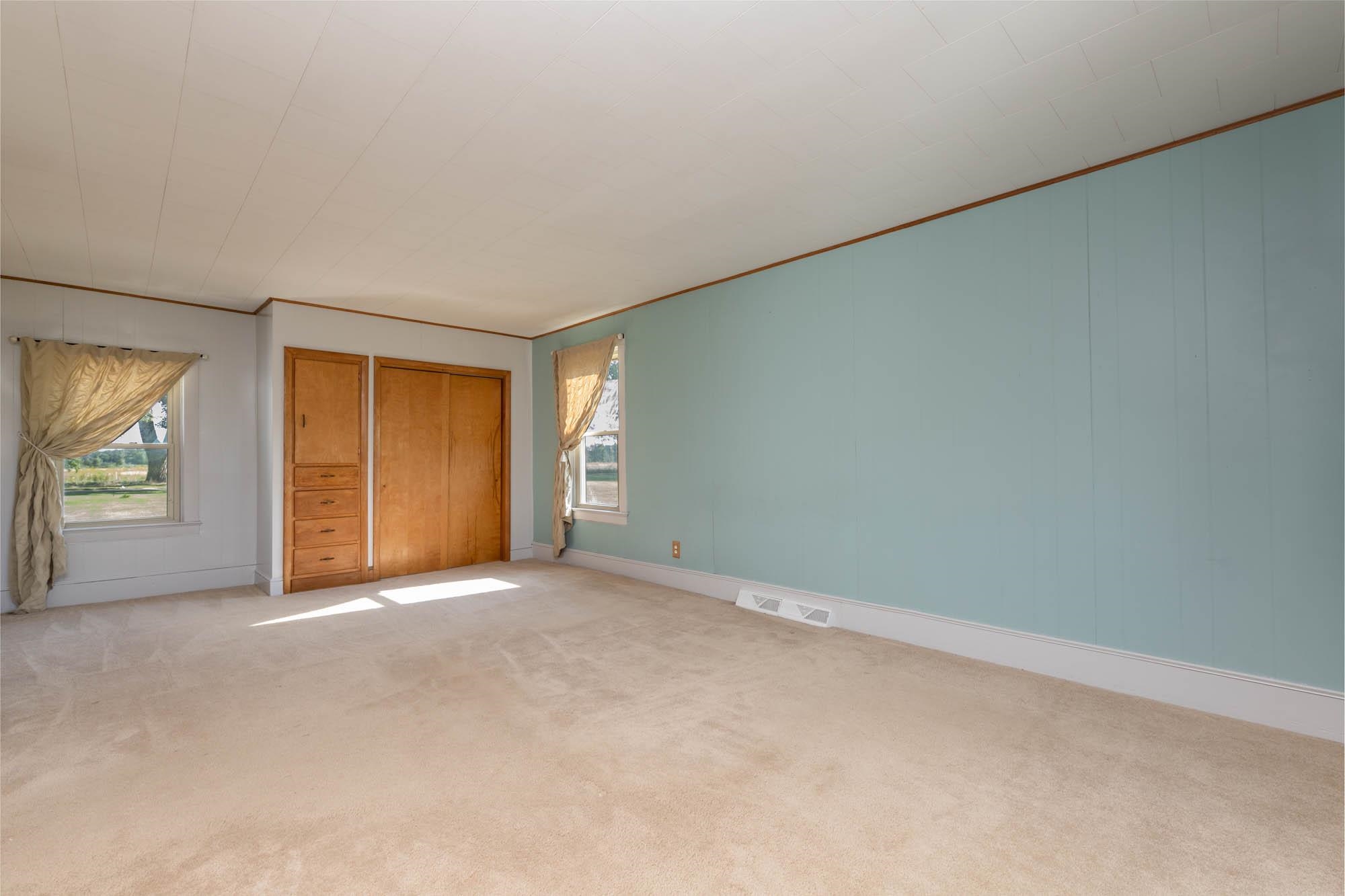 4868 Garden Prairie Road Belvidere, IL 61008 - Photo 15 of 36 an empty room with windows