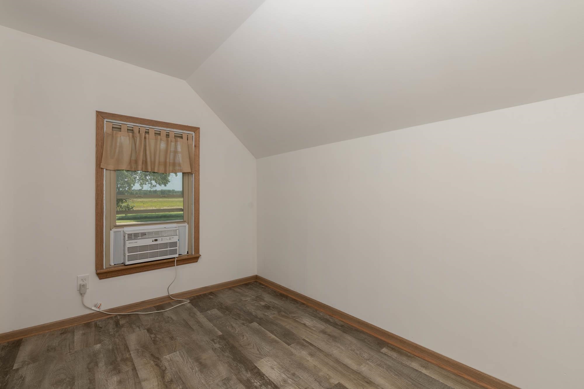 4868 Garden Prairie Road Belvidere, IL 61008 - Photo 24 of 36 a view of an empty room and window