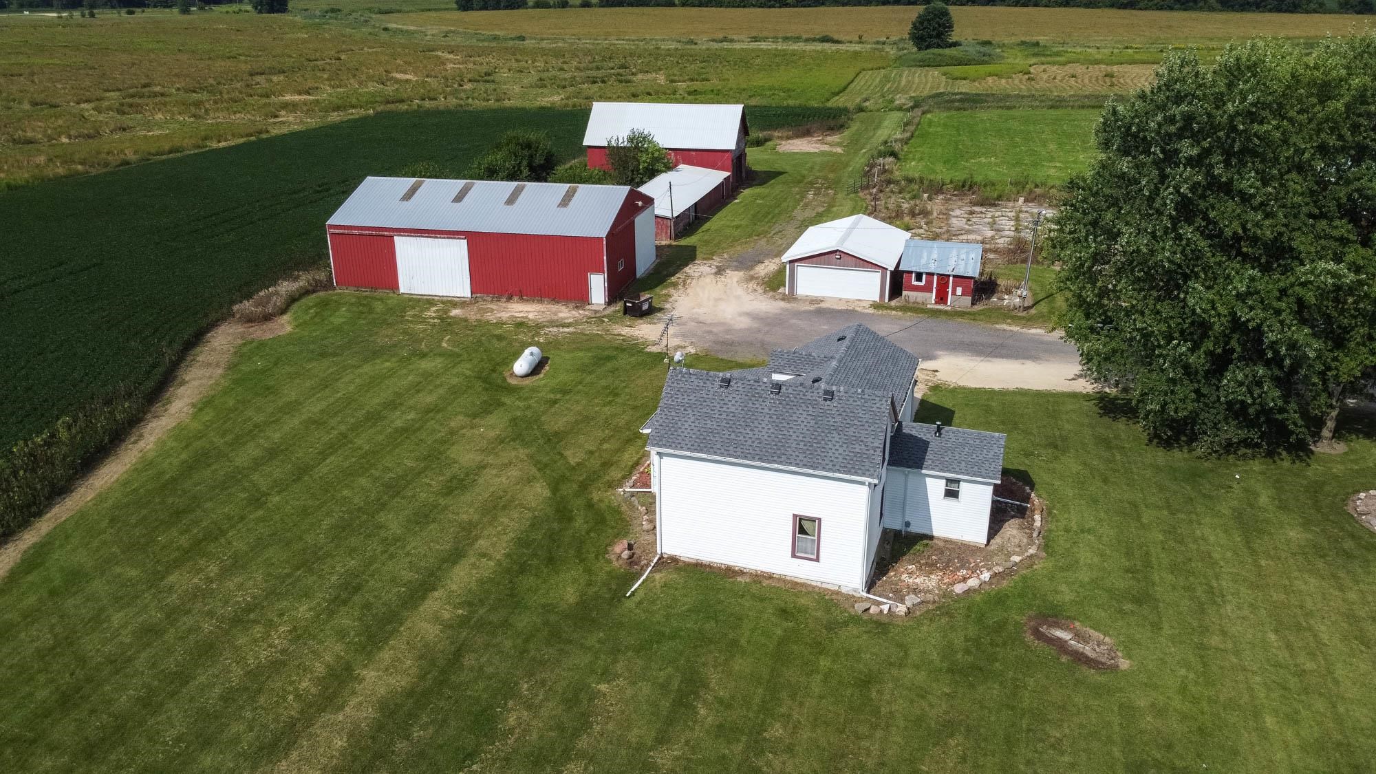4868 Garden Prairie Road Belvidere, IL 61008 - Photo 3 of 36 a view of a house with a yard