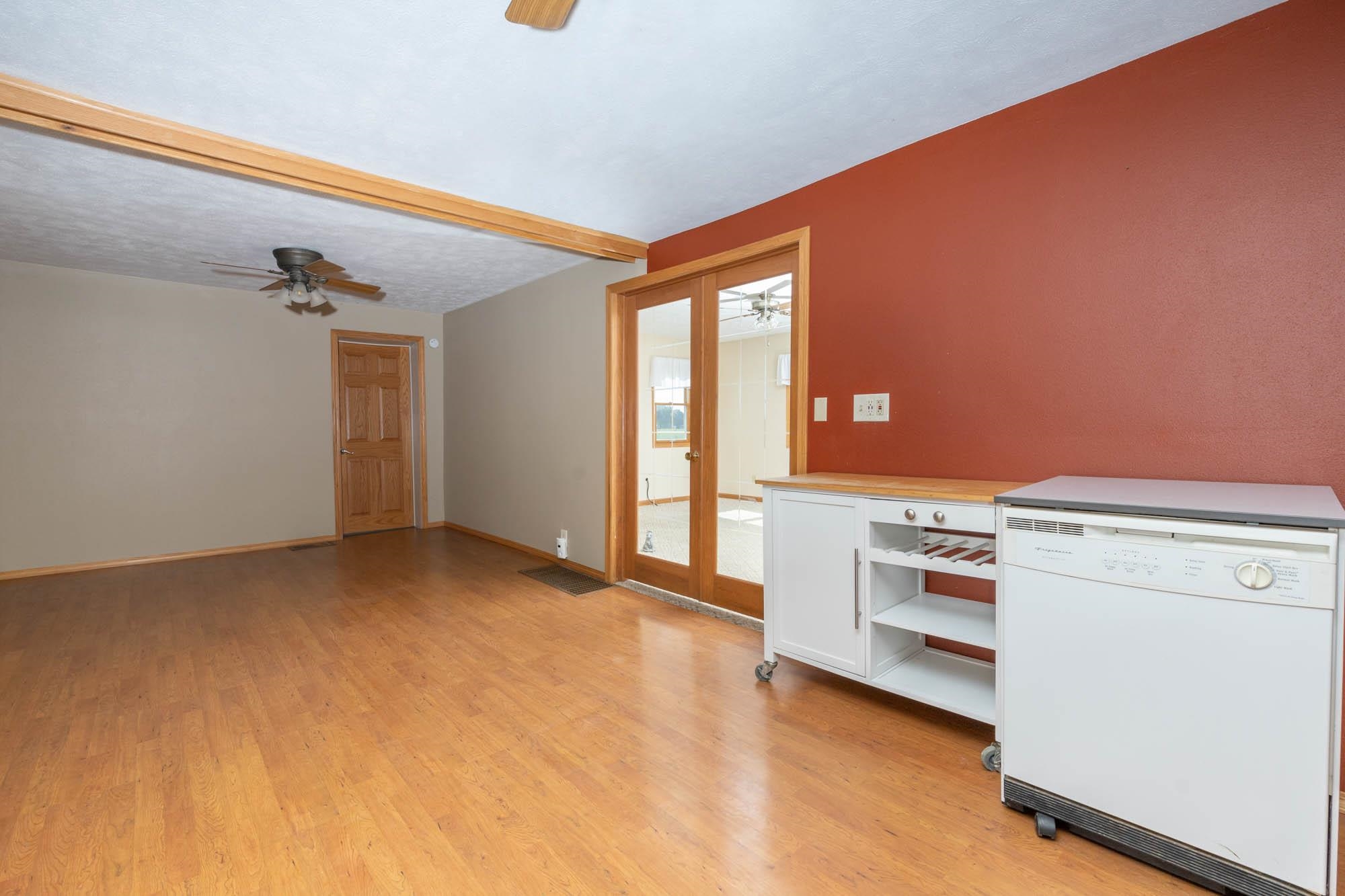 4868 Garden Prairie Road Belvidere, IL 61008 - Photo 8 of 36 a view of an empty room with a window