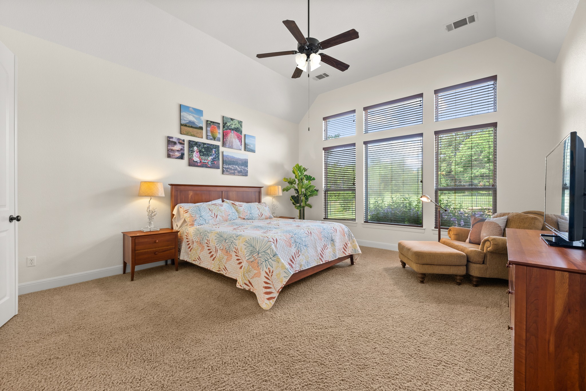 1301 Lions Lair Leander, TX 78641 - Photo 16 of 40 Main-level primary suite overlooking the backyard and pool