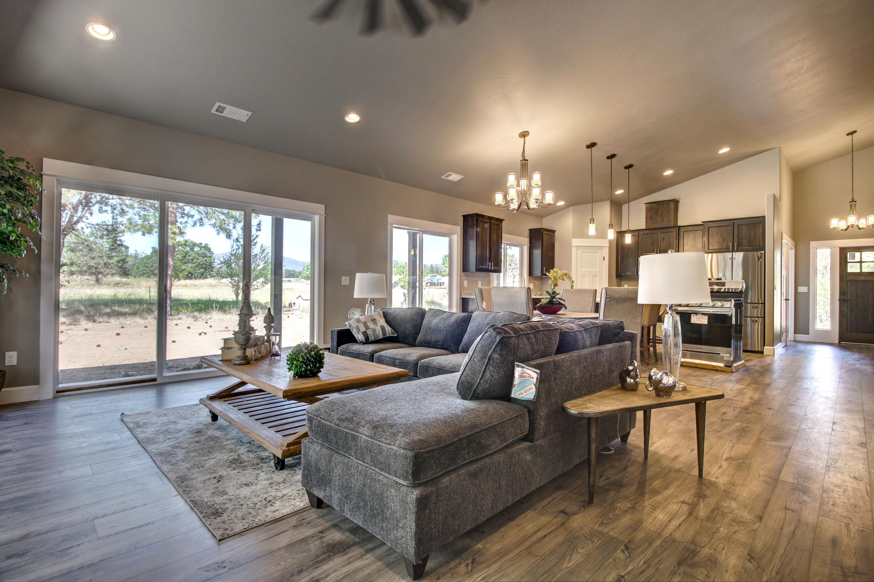 3217 Sams Valley Road White City, OR 97503 - Photo 10 of 40 a living room with furniture and a large window