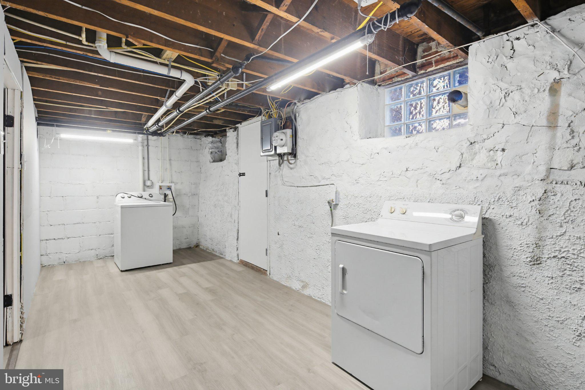 12 North Rosedale Street Baltimore, MD 21229 - Photo 12 of 25 Bright and spacious laundry area.