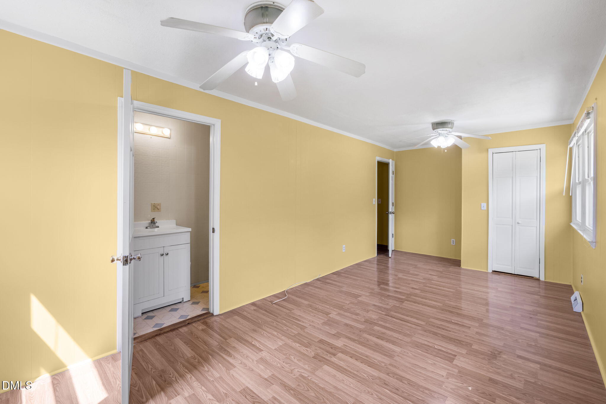 95 Harold Gill Road Roxboro, NC 27574 - Photo 20 of 53 a view of an empty room with wooden floor