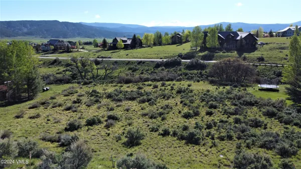 with view of a house with a yard