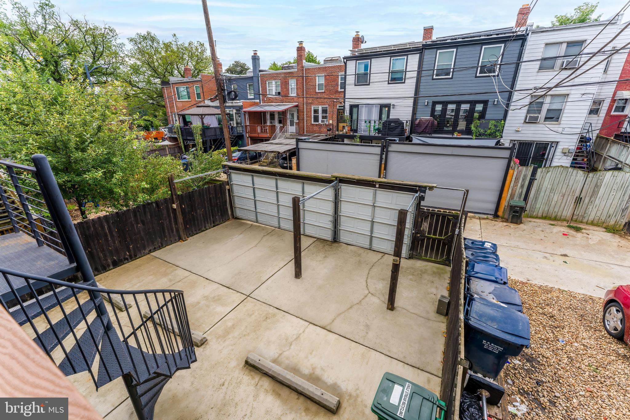 1613 Isherwood Street Northeast, Unit 3 Washington, DC 20002 - Photo 20 of 23 a view of a patio with couches table and chairs and potted plants
