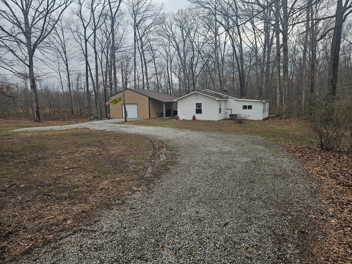 13751 North Condor Lane Bluford, IL 62814 - Photo 2 of 38 a front view of a house with a yard and trees