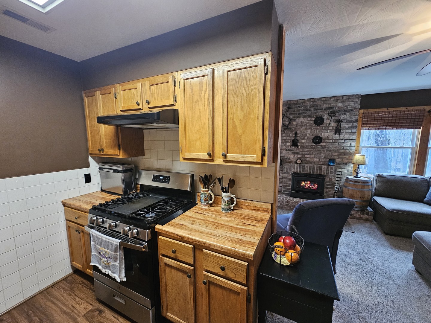 13751 North Condor Lane Bluford, IL 62814 - Photo 27 of 38 a kitchen with stainless steel appliances granite countertop a stove a sink and a microwave