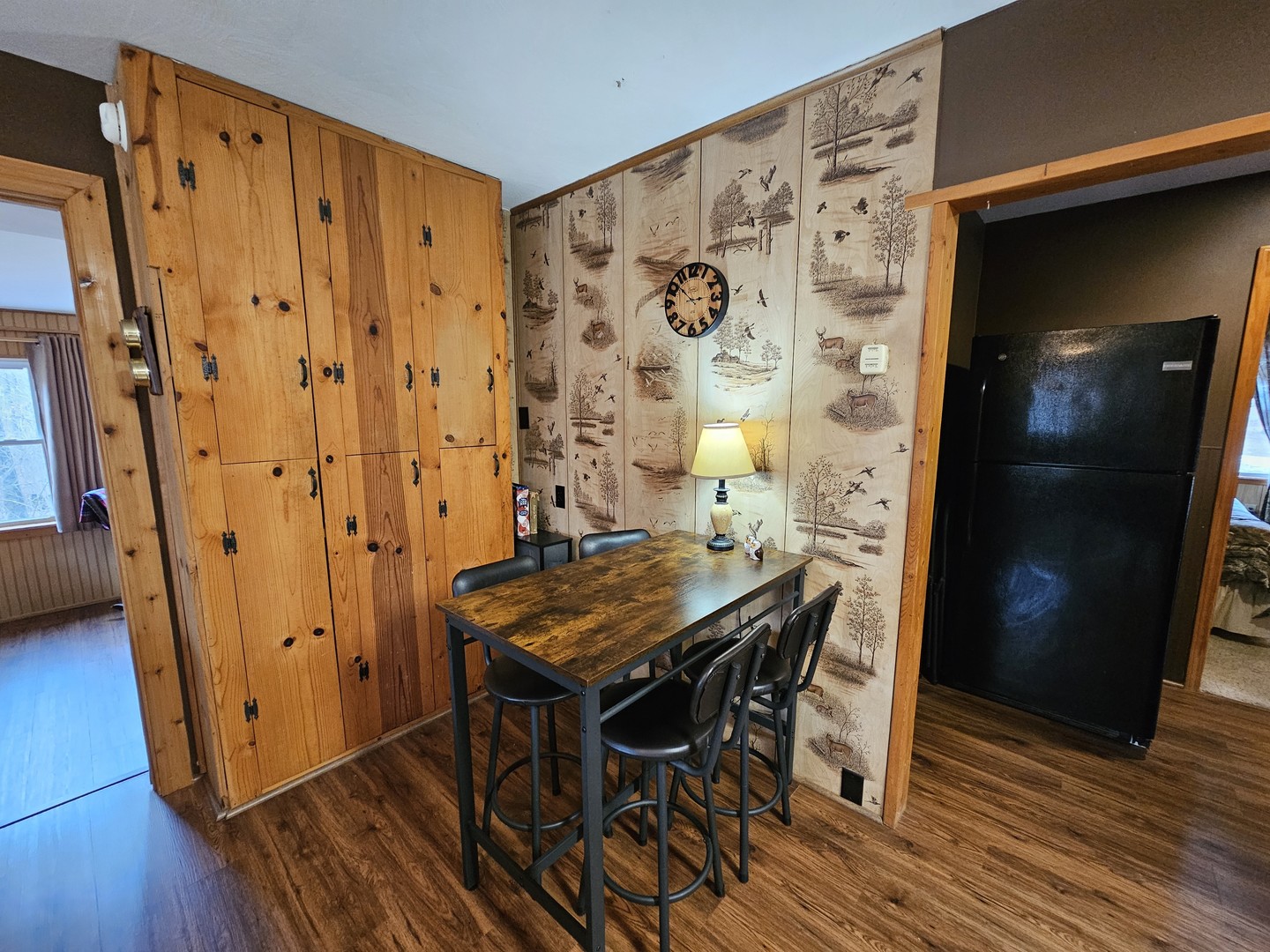 13751 North Condor Lane Bluford, IL 62814 - Photo 28 of 38 a view of a dining room with furniture and wooden floor