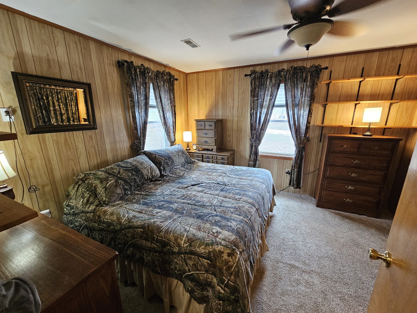 13751 North Condor Lane Bluford, IL 62814 - Photo 31 of 38 a bedroom with a bed and a dresser