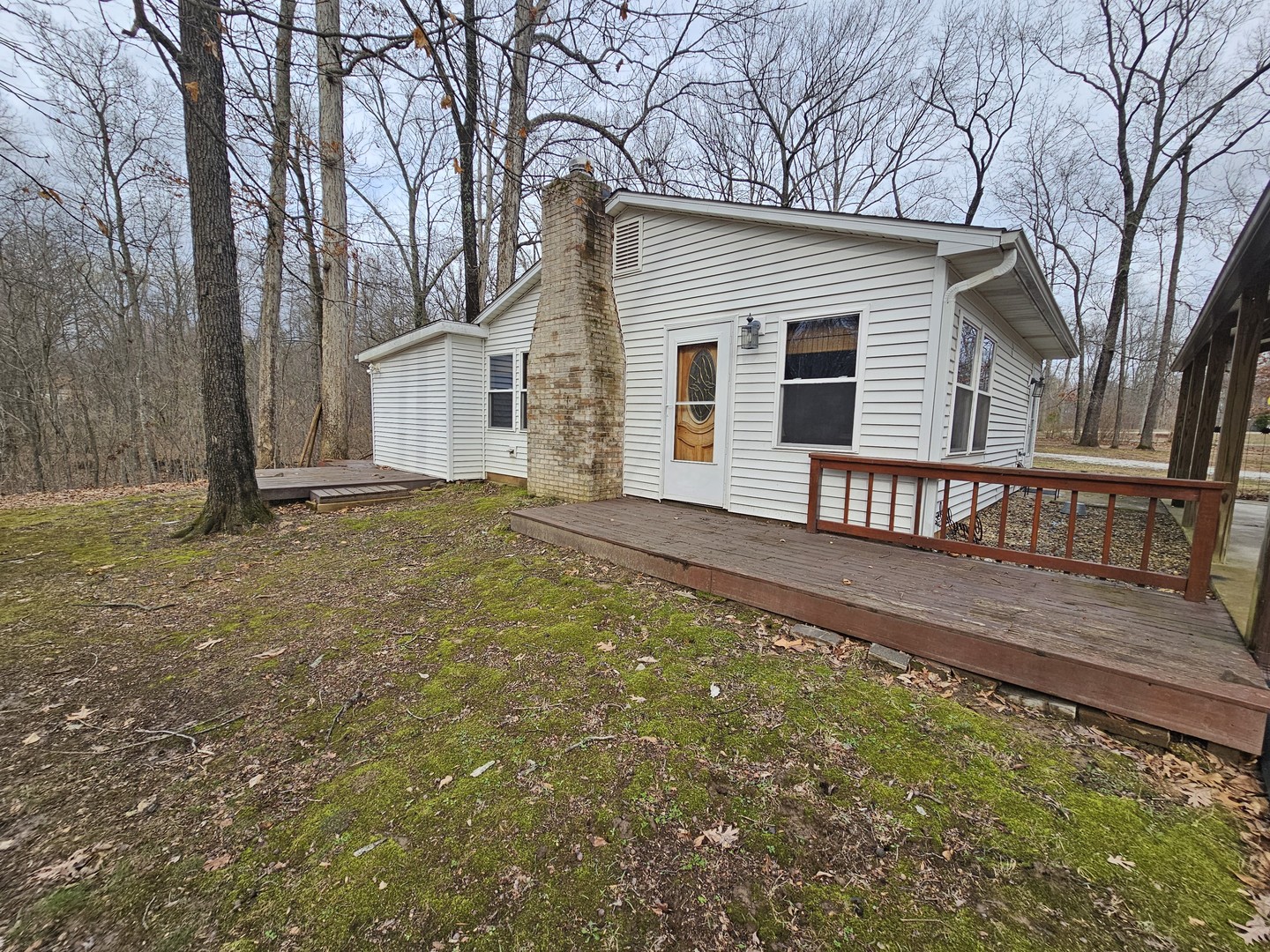 13751 North Condor Lane Bluford, IL 62814 - Photo 6 of 38 a view of a house with a wooden fence