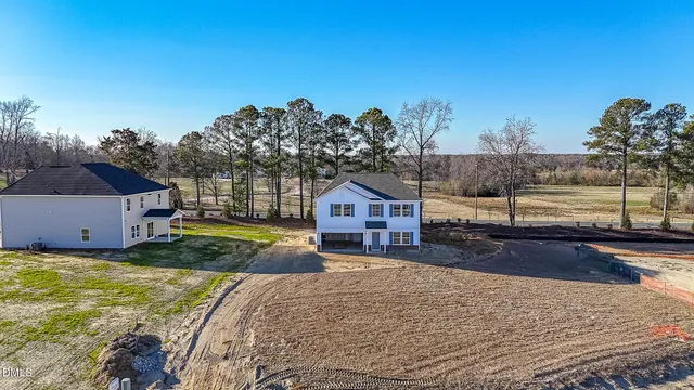 a house view with a garden space