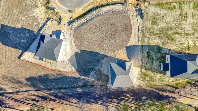 a view of a couches chair and the floor to ceiling window