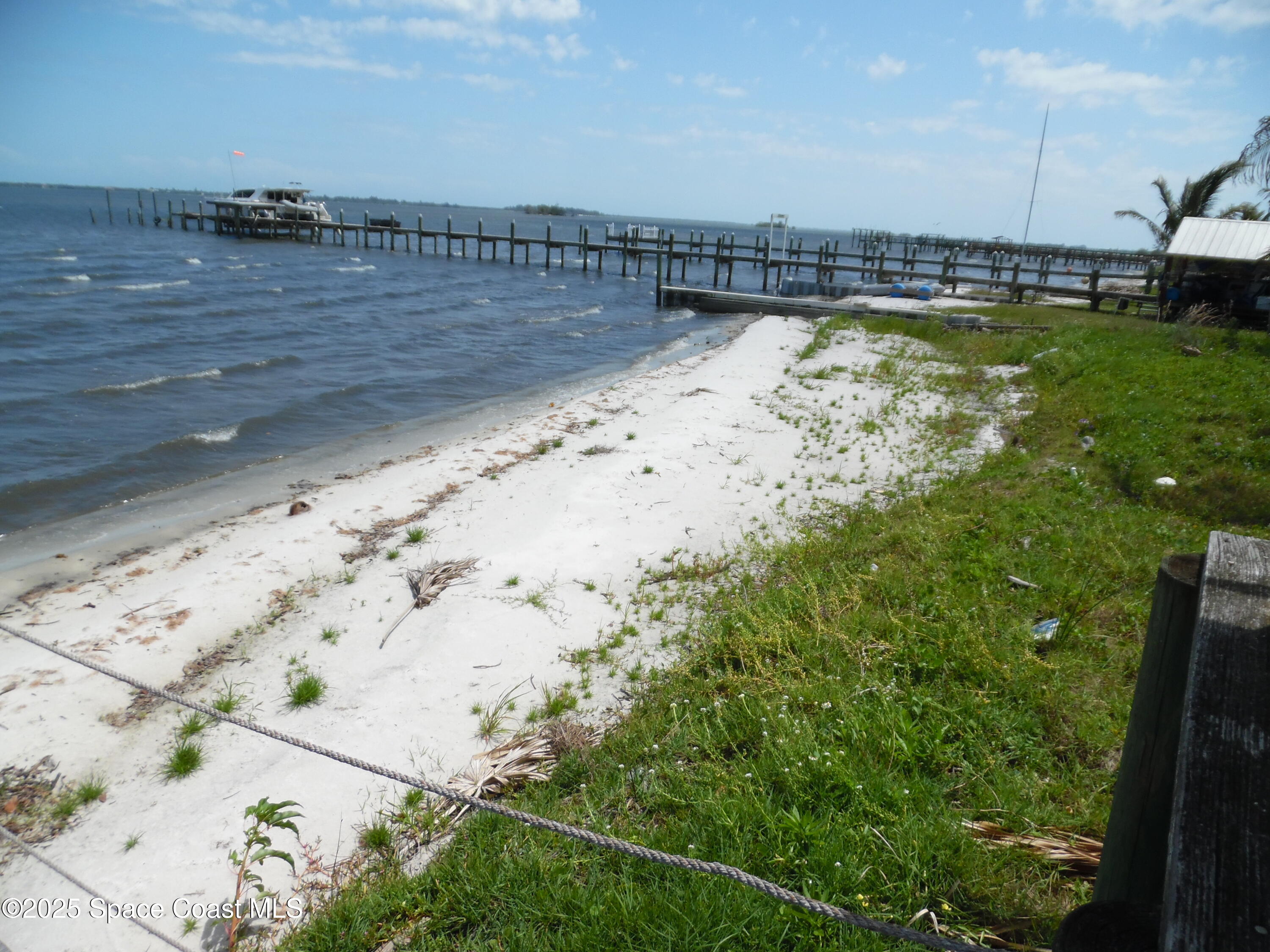 7492 Highway 1, Unit CODE Micco, FL 32976 - Photo 8 of 13 a view of a lake view