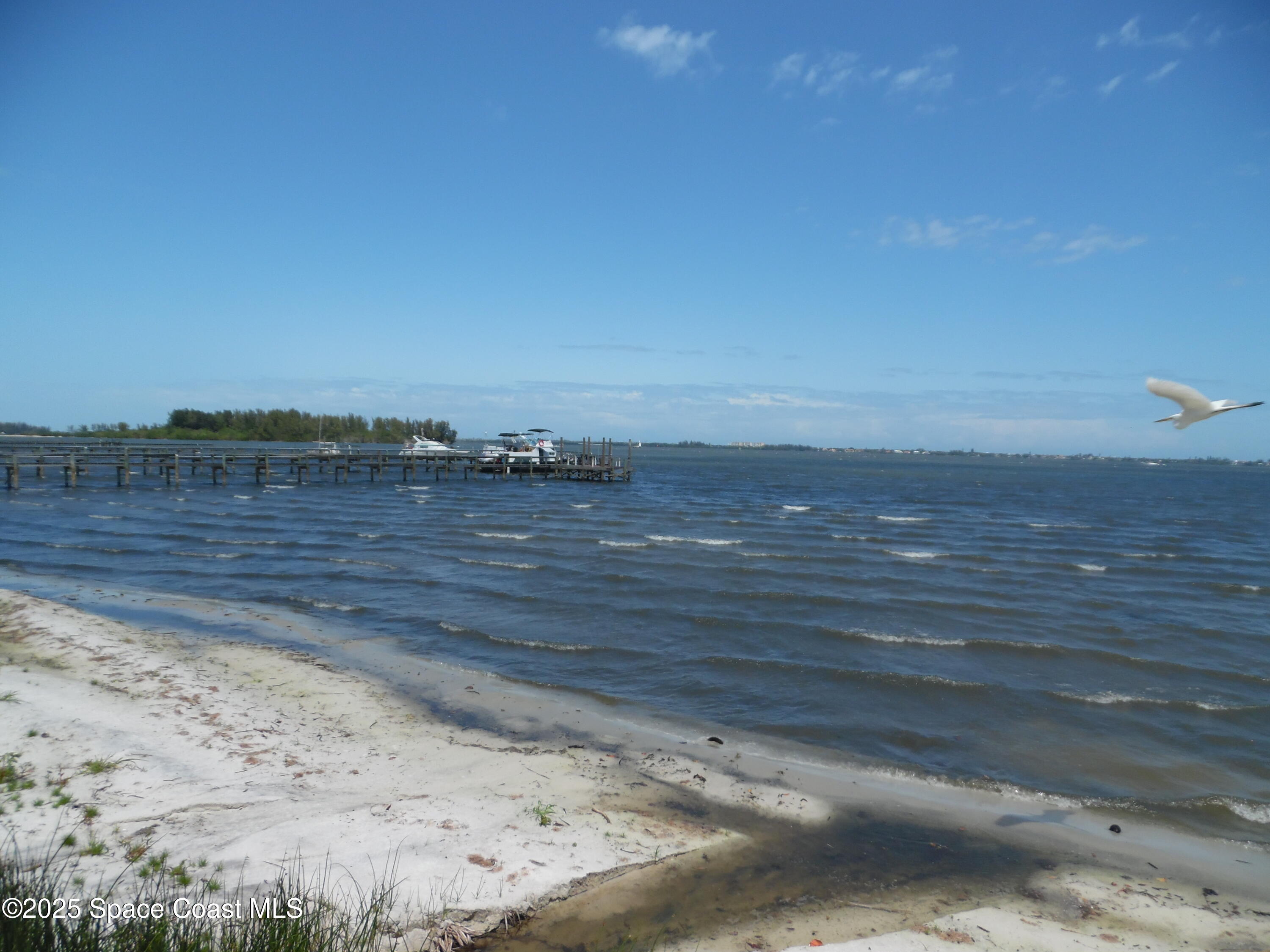 7492 Highway 1, Unit CODE Micco, FL 32976 - Photo 9 of 13 a view of ocean view with beach