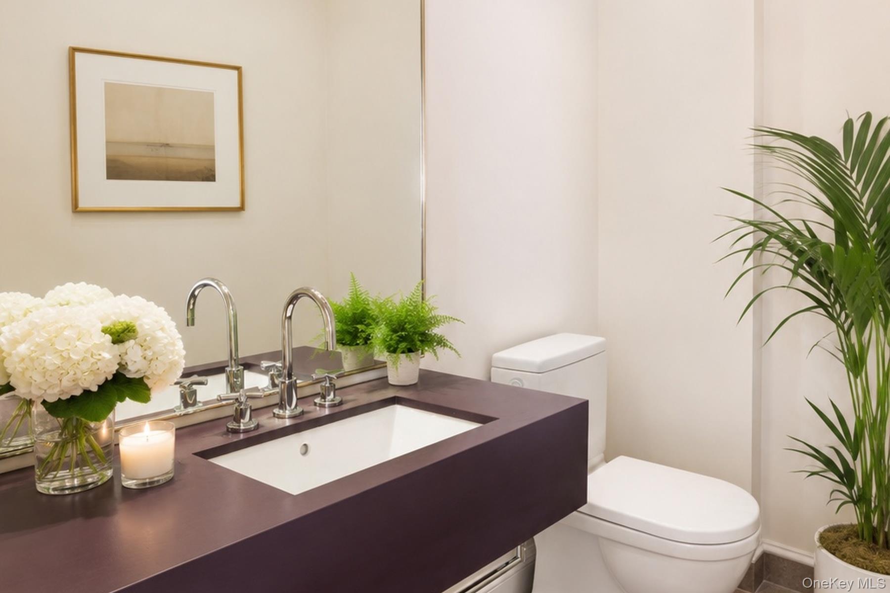 486 Middle Line Highway Bridgehampton, NY 11976 - Photo 12 of 28 a bathroom with a toilet a sink and mirror