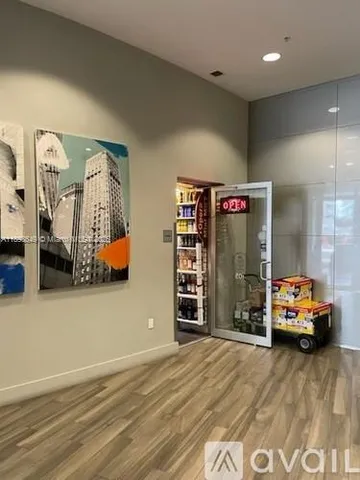 a view of a livingroom with furniture and car park