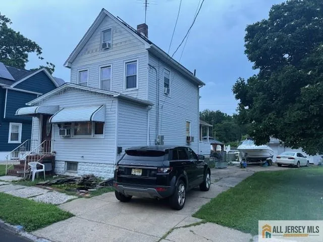 a car parked in front of a house
