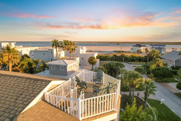 a living room with furniture window and wooden floor