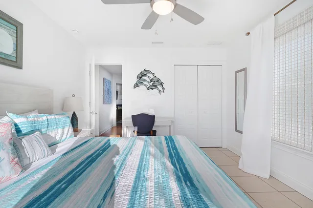 a view of a balcony with furniture and wooden floor