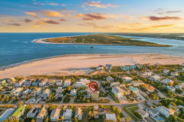 a view of a swimming pool with an outdoor seating