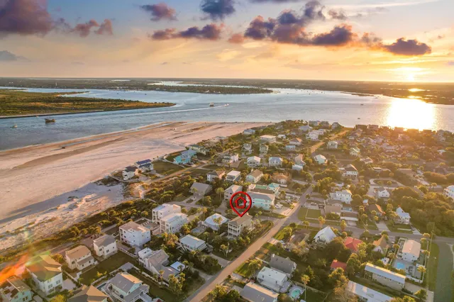 a garden with a building in the background