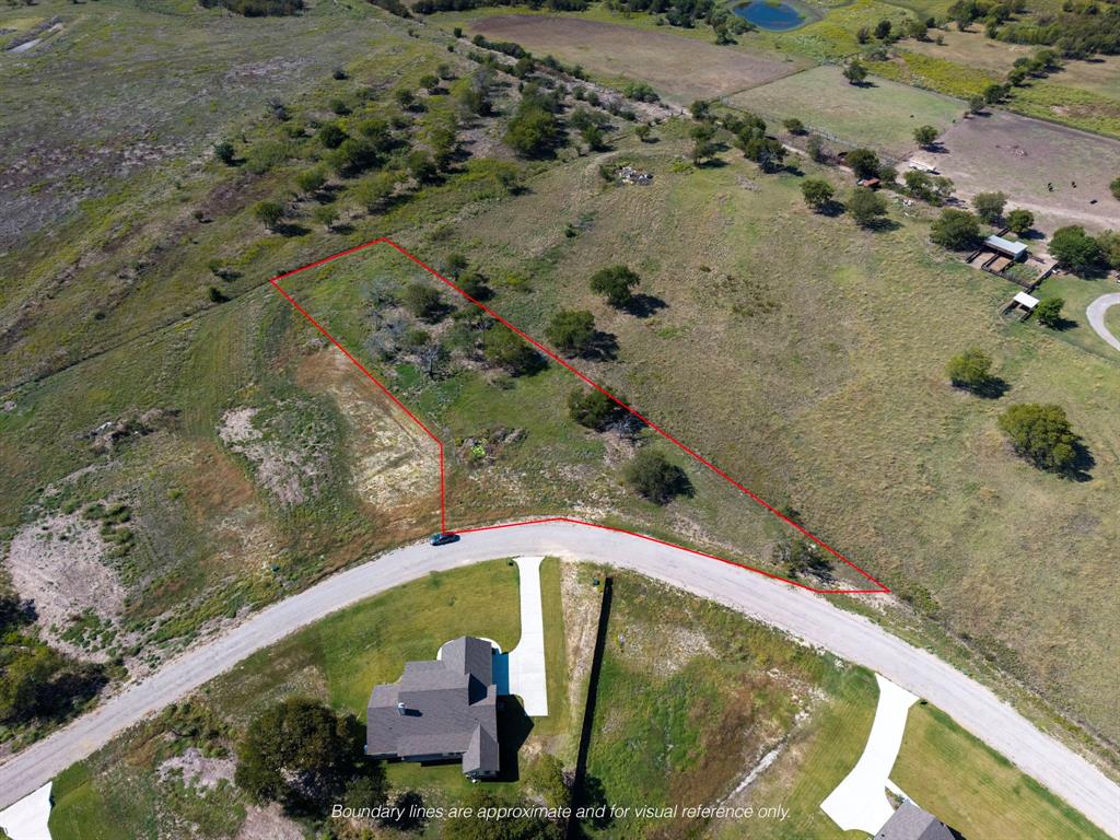 1004 Don Eve Court Azle, TX 76020 - Photo 2 of 8 an aerial view of a house with a yard