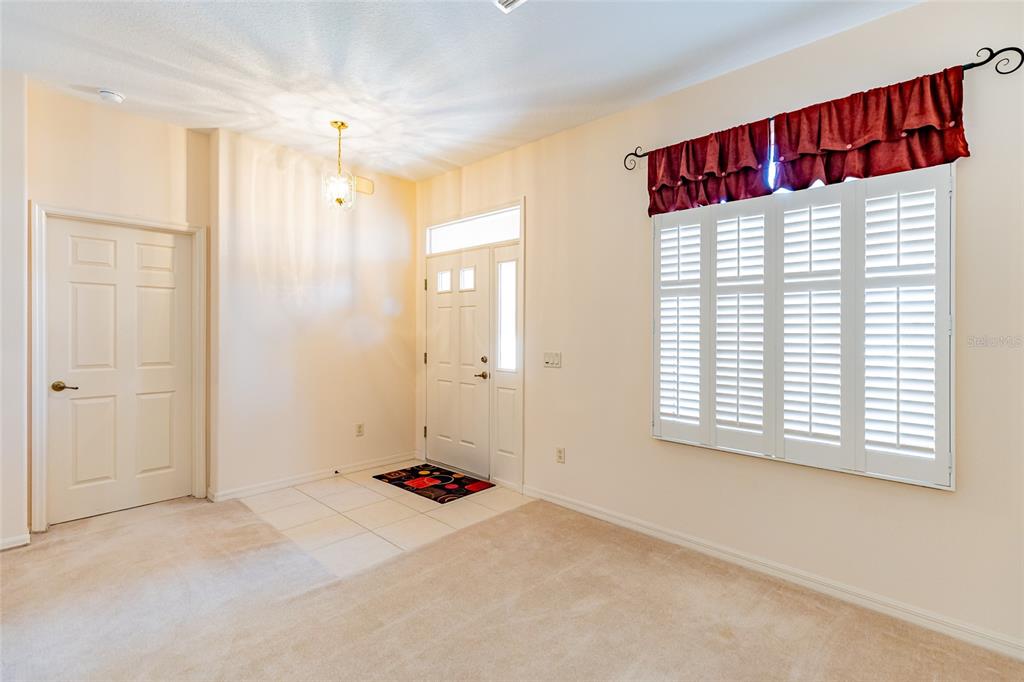 15788 Southwest 11th Terrace Road Ocala, FL 34473 - Photo 12 of 59 a view of a room with a window and staircase
