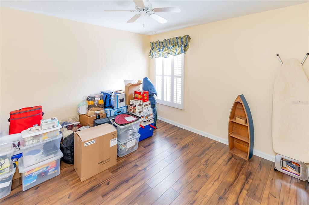 15788 Southwest 11th Terrace Road Ocala, FL 34473 - Photo 26 of 59 a view of a room with toys and wooden floor