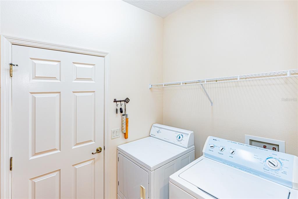 15788 Southwest 11th Terrace Road Ocala, FL 34473 - Photo 32 of 59 a utility room with dryer and washer