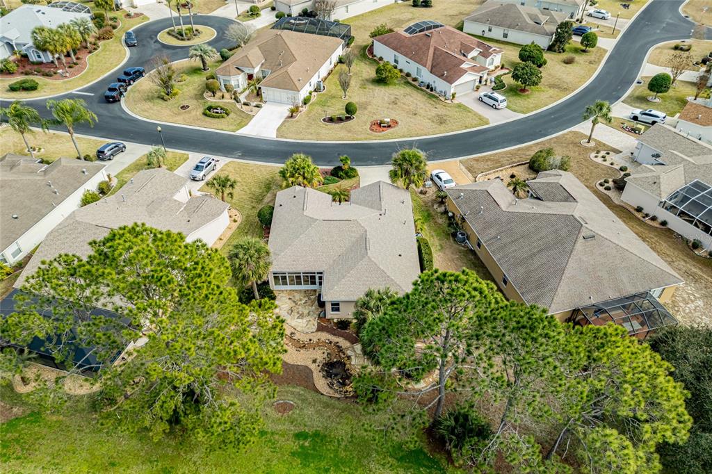 15788 Southwest 11th Terrace Road Ocala, FL 34473 - Photo 47 of 59 an aerial view of a house with a yard and pool