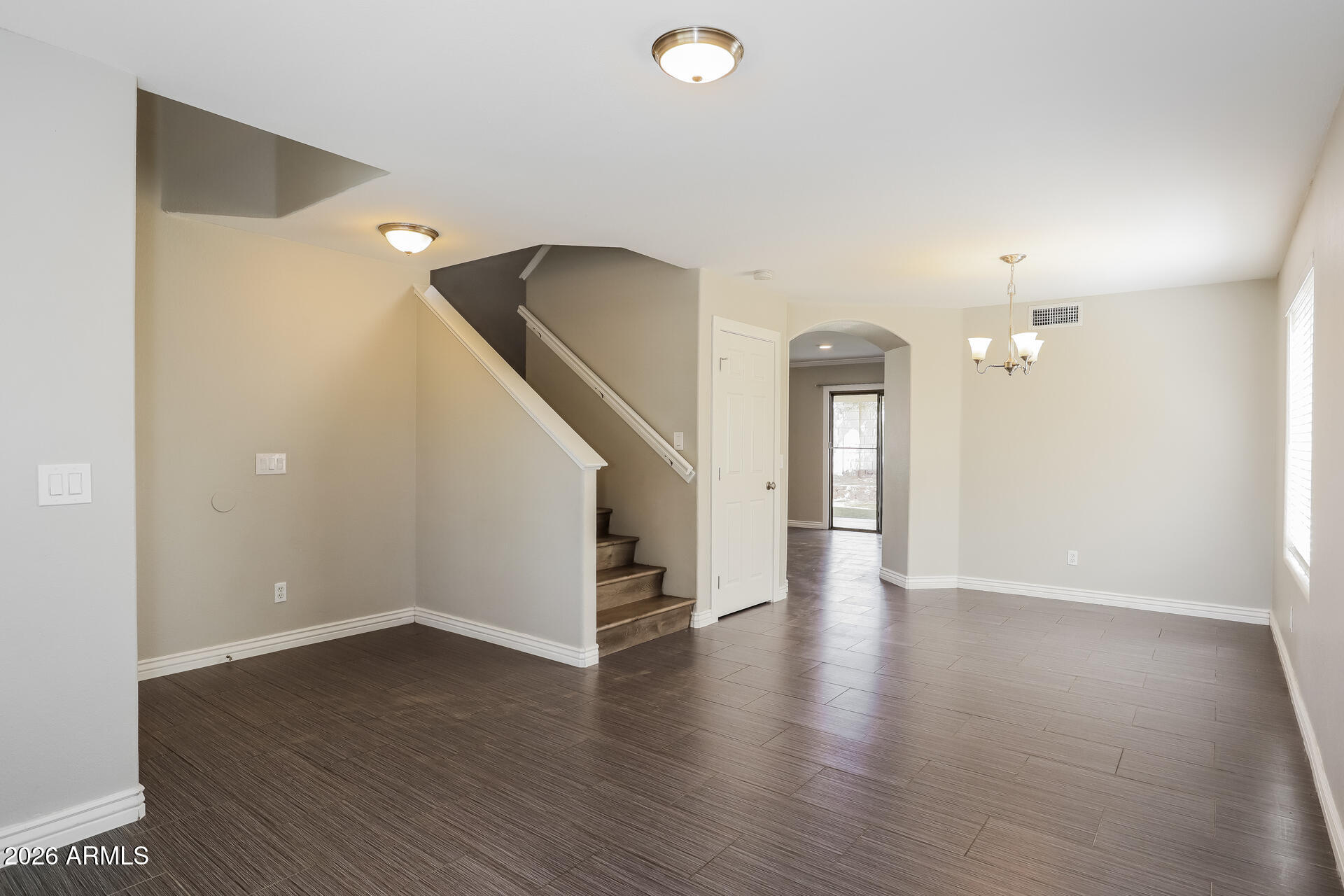 12706 West Desert Rose Road Avondale, AZ 85392 - Photo 2 of 17 003-photo-living-room-14003149