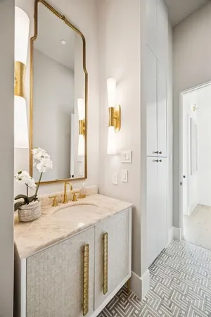 a bathroom with a sink and a mirror
