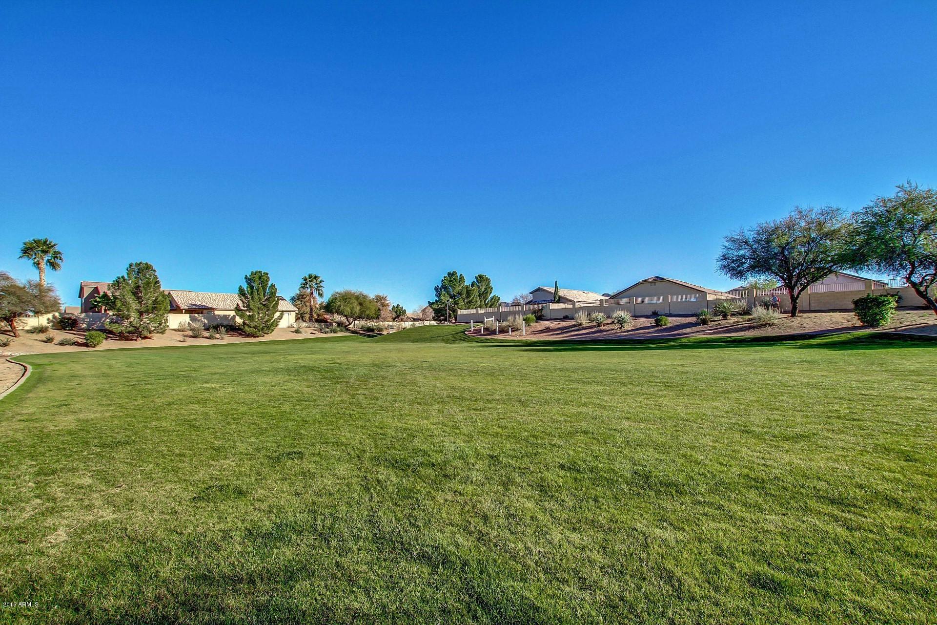 4407 West Maldonado Road Laveen, AZ 85339 - Photo 32 of 32 Community Greenbelt, Behind Home